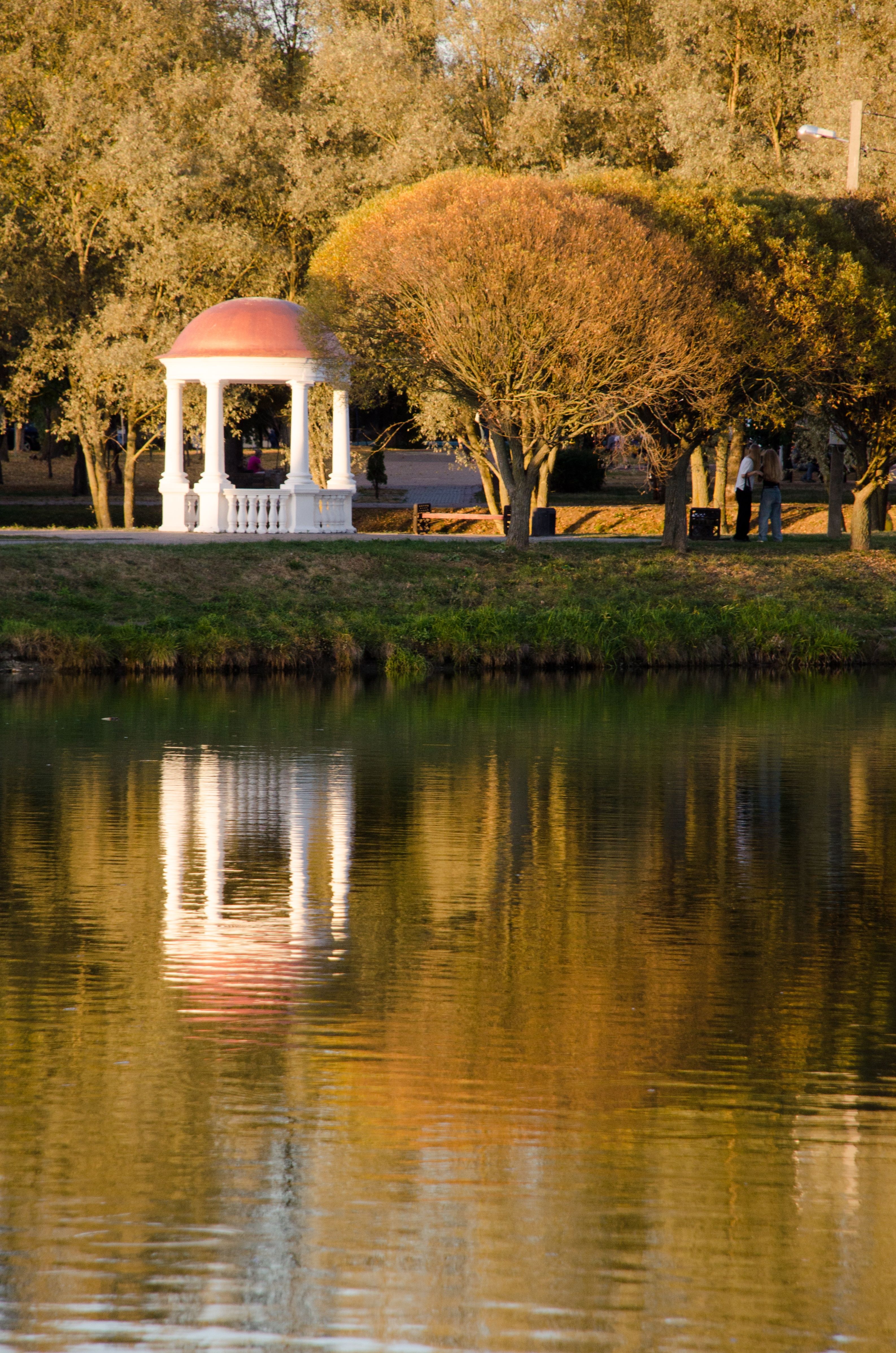 Scenic Park Gazebo Reflection at Sunset · Free Stock Photo