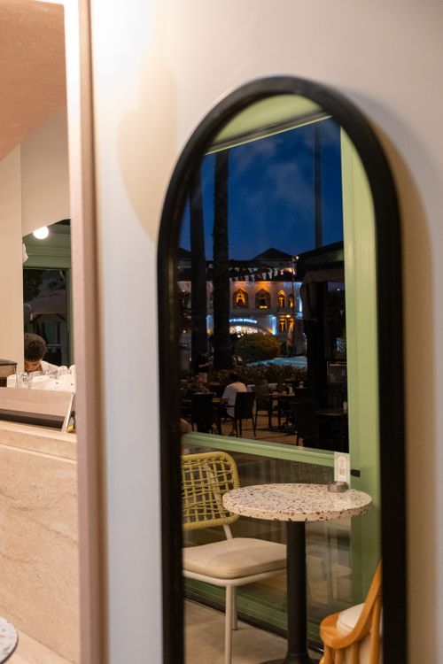 Cafe Design Using Mirror Charming Cafe Scene Reflected in Mirror at Dusk · Free Stock Photo