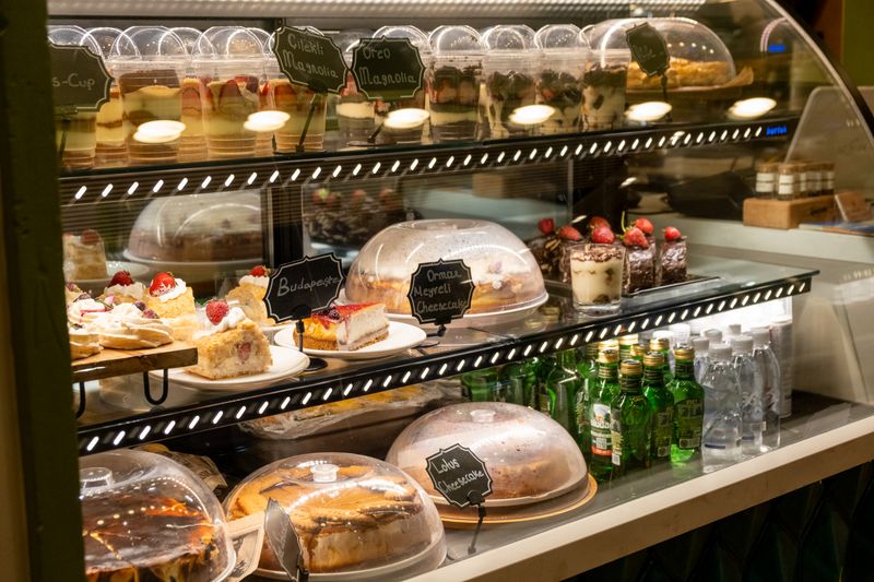Seasonal cakes and pastries displayed at the Grounded Coffee Co. counter