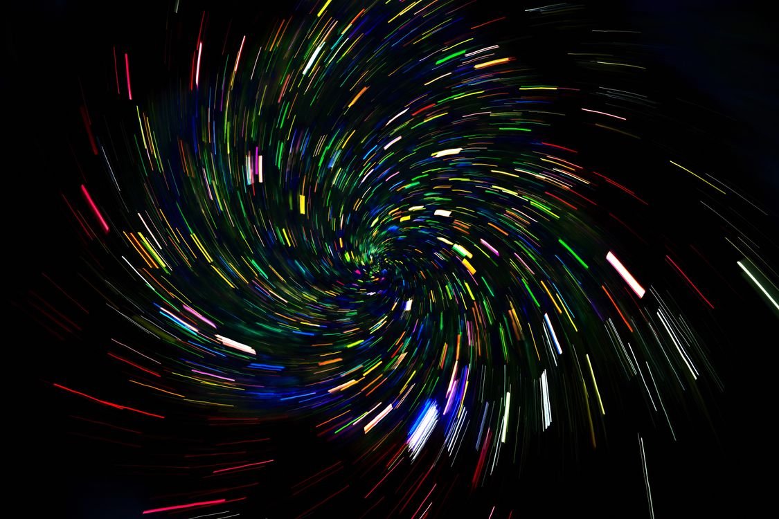 Light Trail Pattern Vibrant Light Trails Creating Spiral Pattern · Free Stock Photo