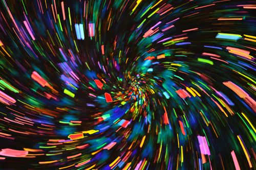 Free Dynamic spiral of vibrant neon lights creates a stunning abstract visual effect. Stock Photo