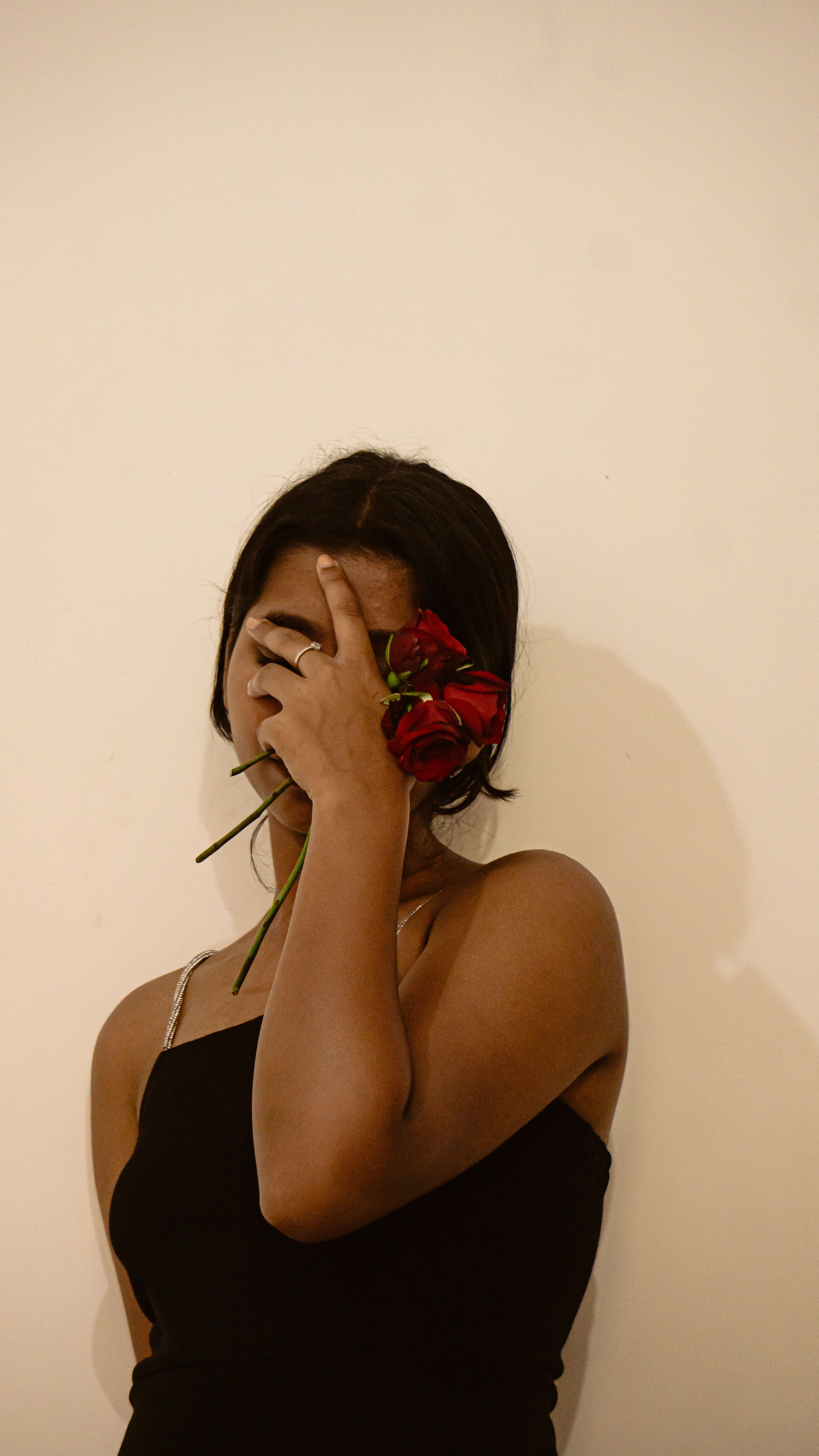 Portrait of Woman with Red Roses · Free Stock Photo
