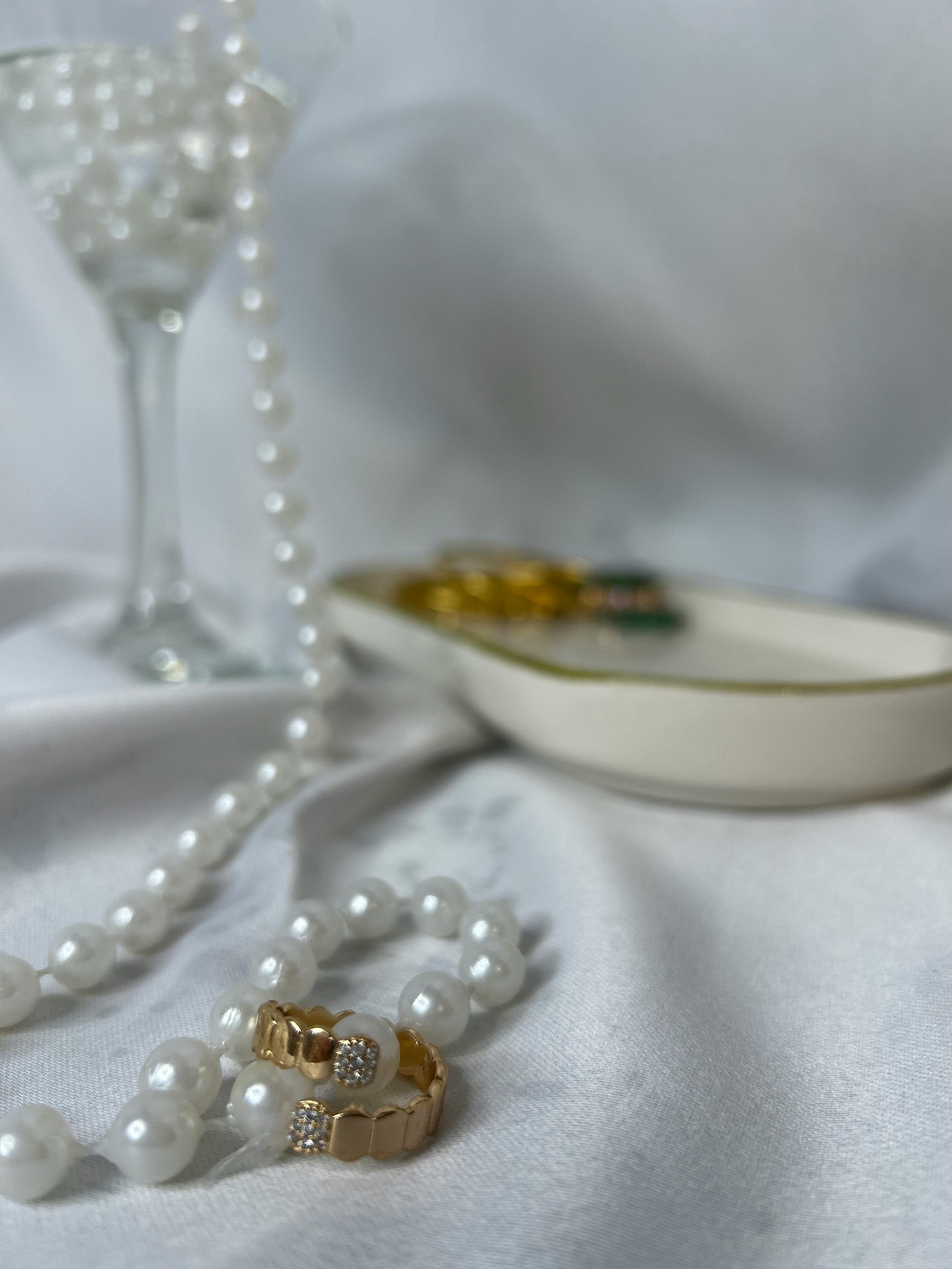 elegant gold and pearl jewelry display