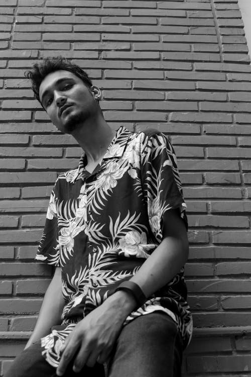 Grayscale Photo of a Man in Floral Shirt 