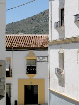 View of a typical Spanish village dental clinic with traditional architecture.