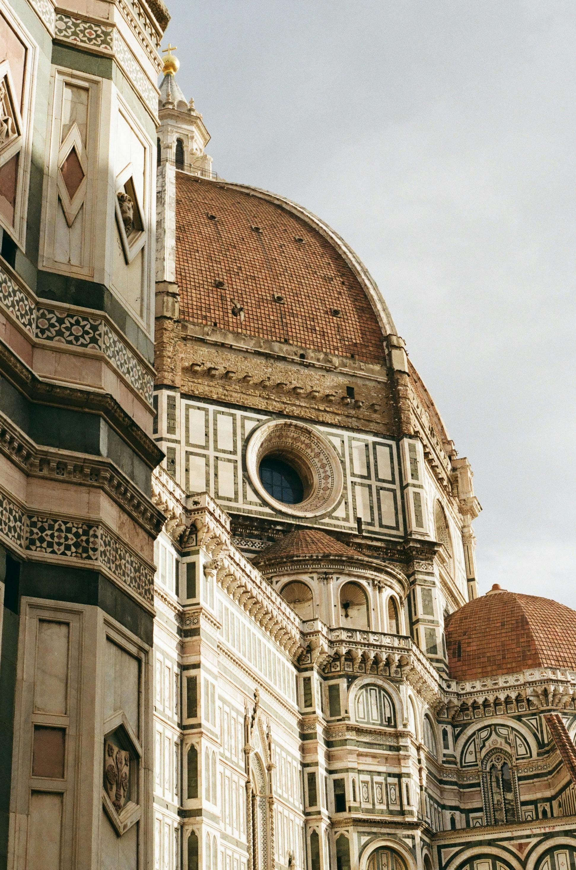Close-up view of Brunelleschi's Dome at Florence Cathedral, capturing stunning Italian architecture.
