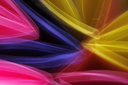 Free Dynamic abstract image featuring vibrant streaks of light in red, yellow, and blue. Stock Photo