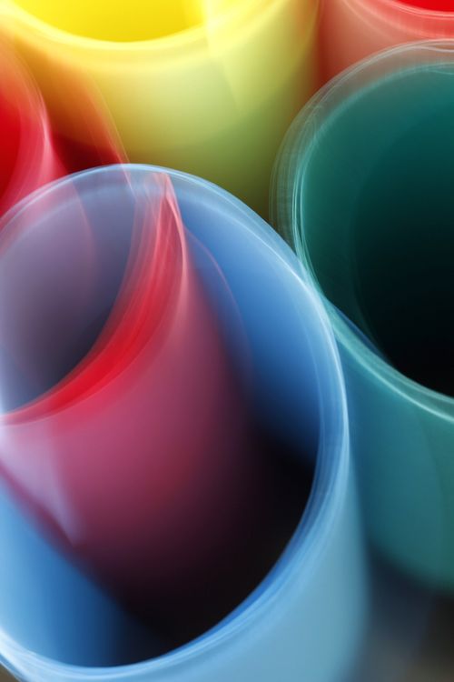 Free Artistic image of vibrant and flowing colorful tubes captured with motion blur. Stock Photo