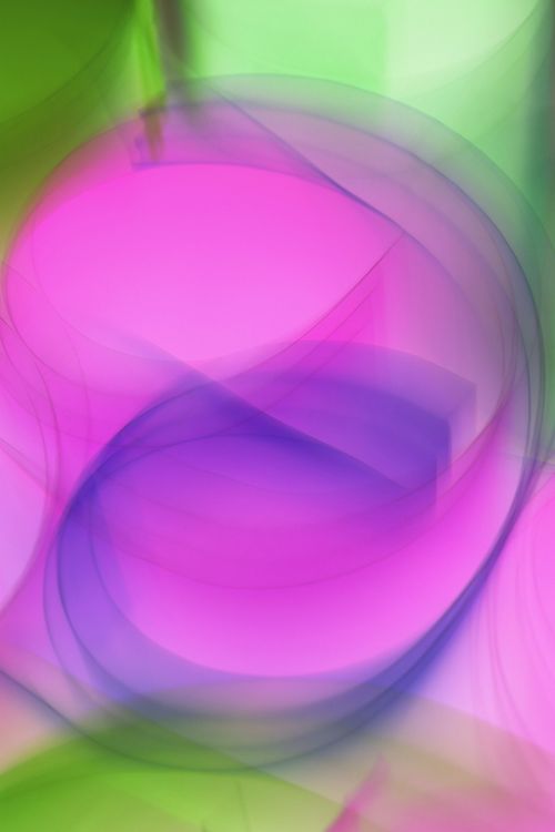 Free Vibrant abstract art with dynamic pink, green, and blue light swirls on a canvas. Perfect for modern design. Stock Photo