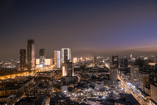 Breathtaking city landscape with illuminated skyscrapers at dusk.