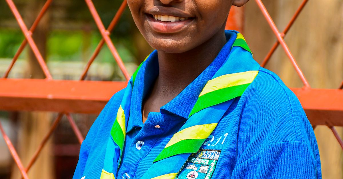 Scout Rwanda Portrait of Smiling Scout in Rwanda's Southern Province · Free Stock Photo