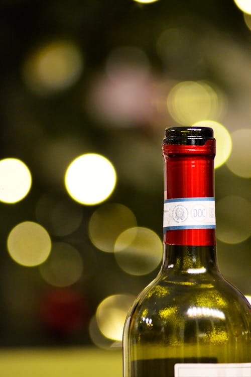 Selective Focus Photography of Wine Bottle