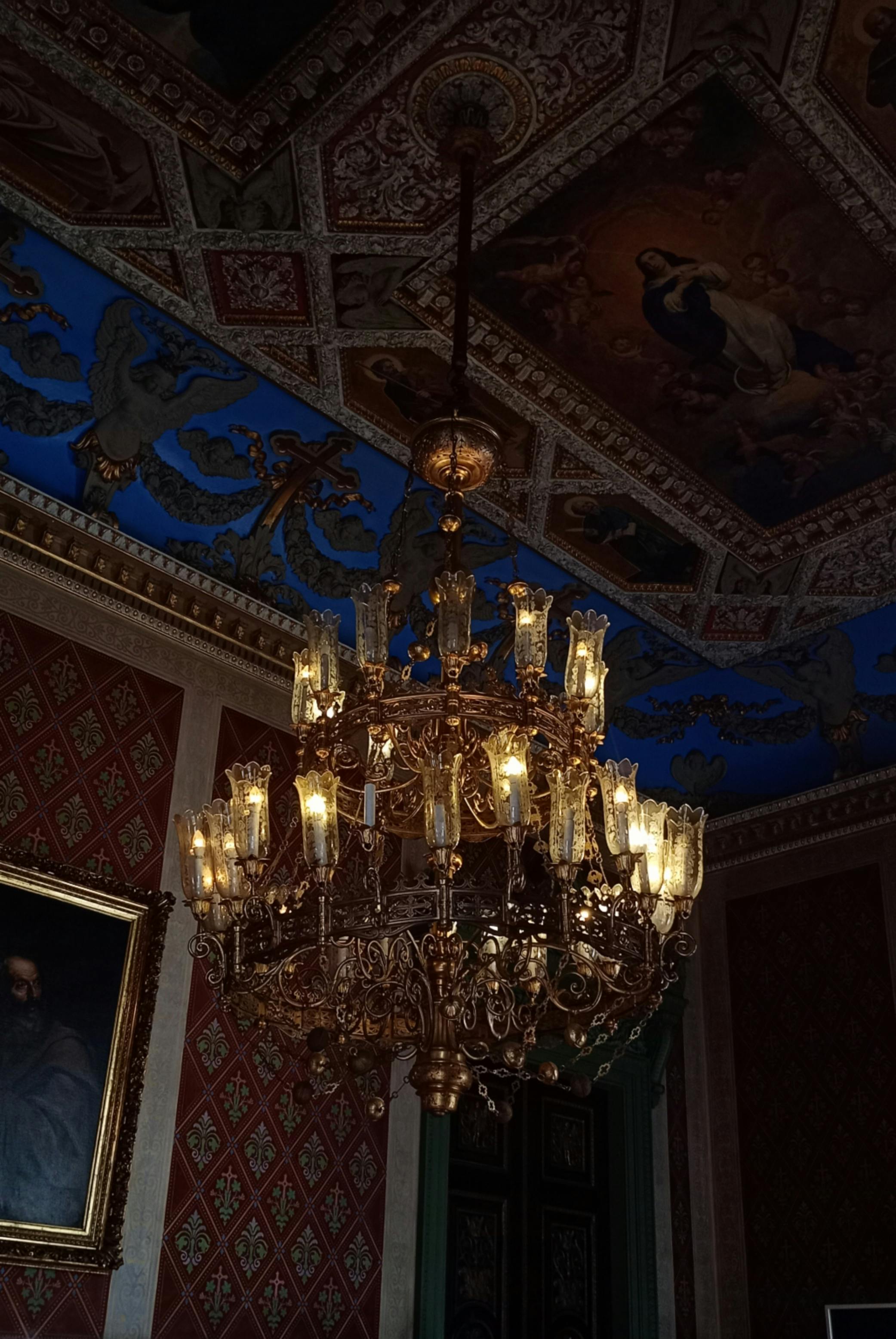 ornate chandelier in luxurious room interior