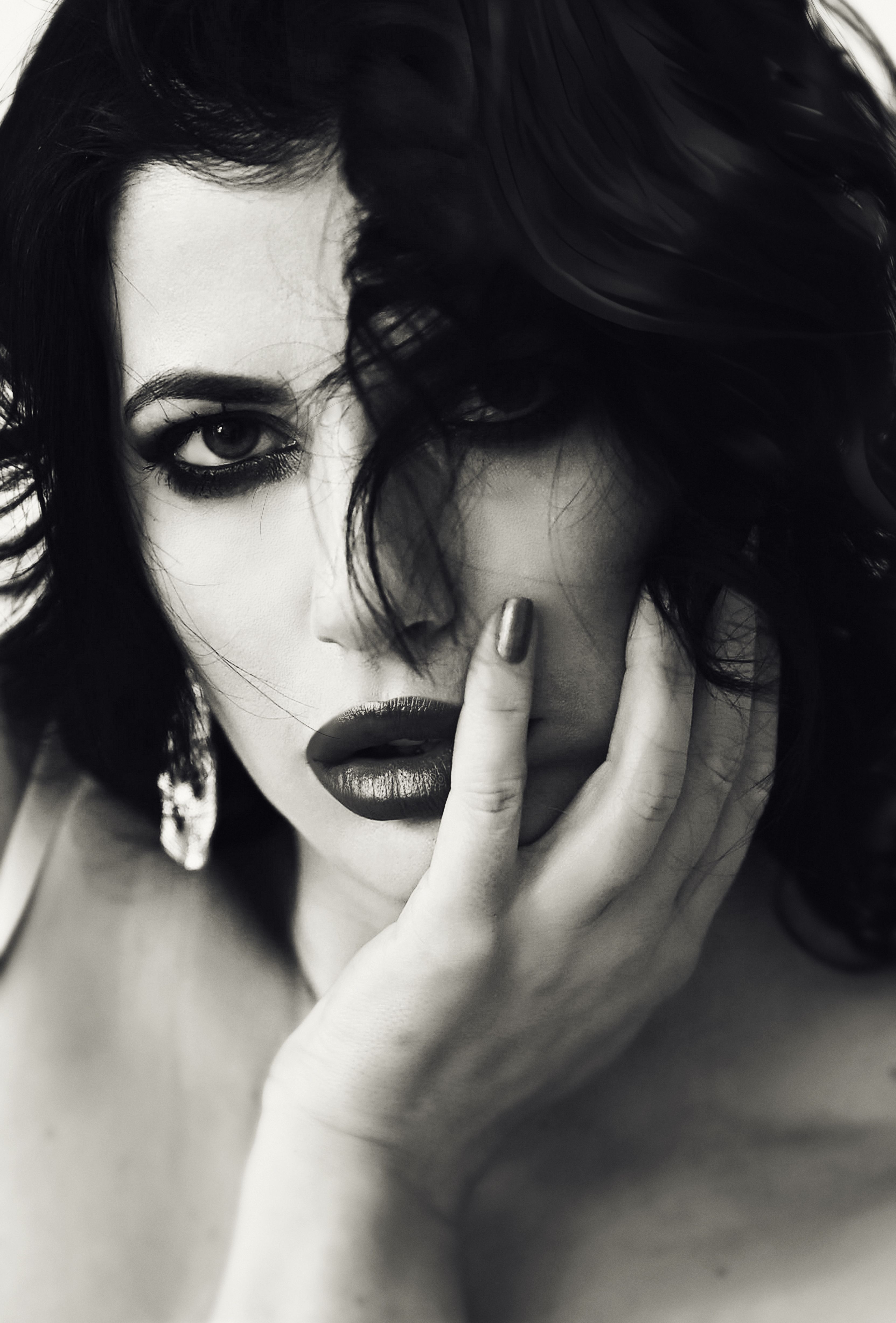 Elegant Black and White Portrait of Woman with Dark Hair · Free Stock Photo