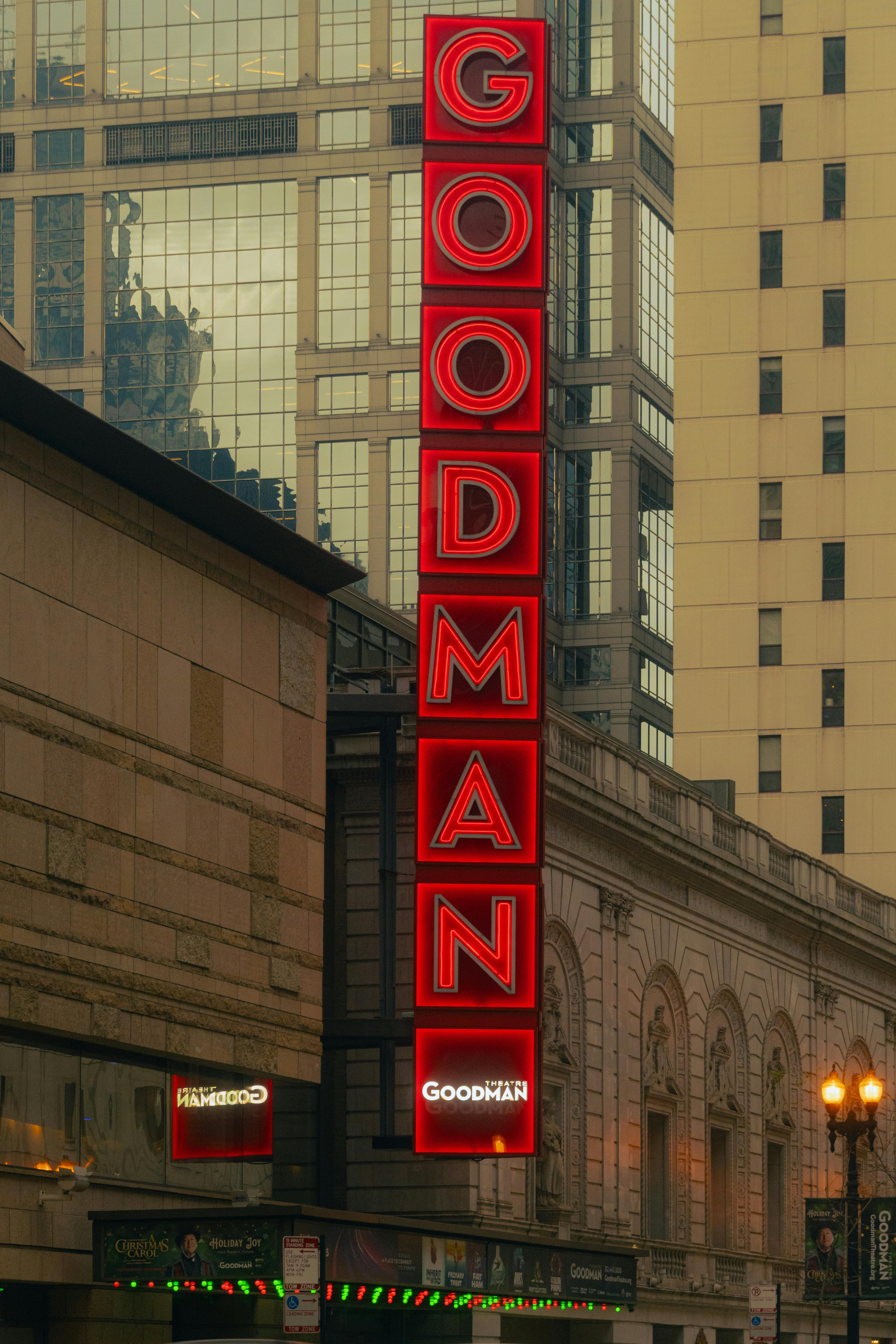 Free The Goodman Theatre sign illuminates Chicago's architecture and vibrant night life. Stock Photo