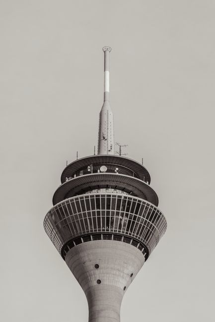 A striking monochrome photograph of an iconic TV tower captured on a clear day.