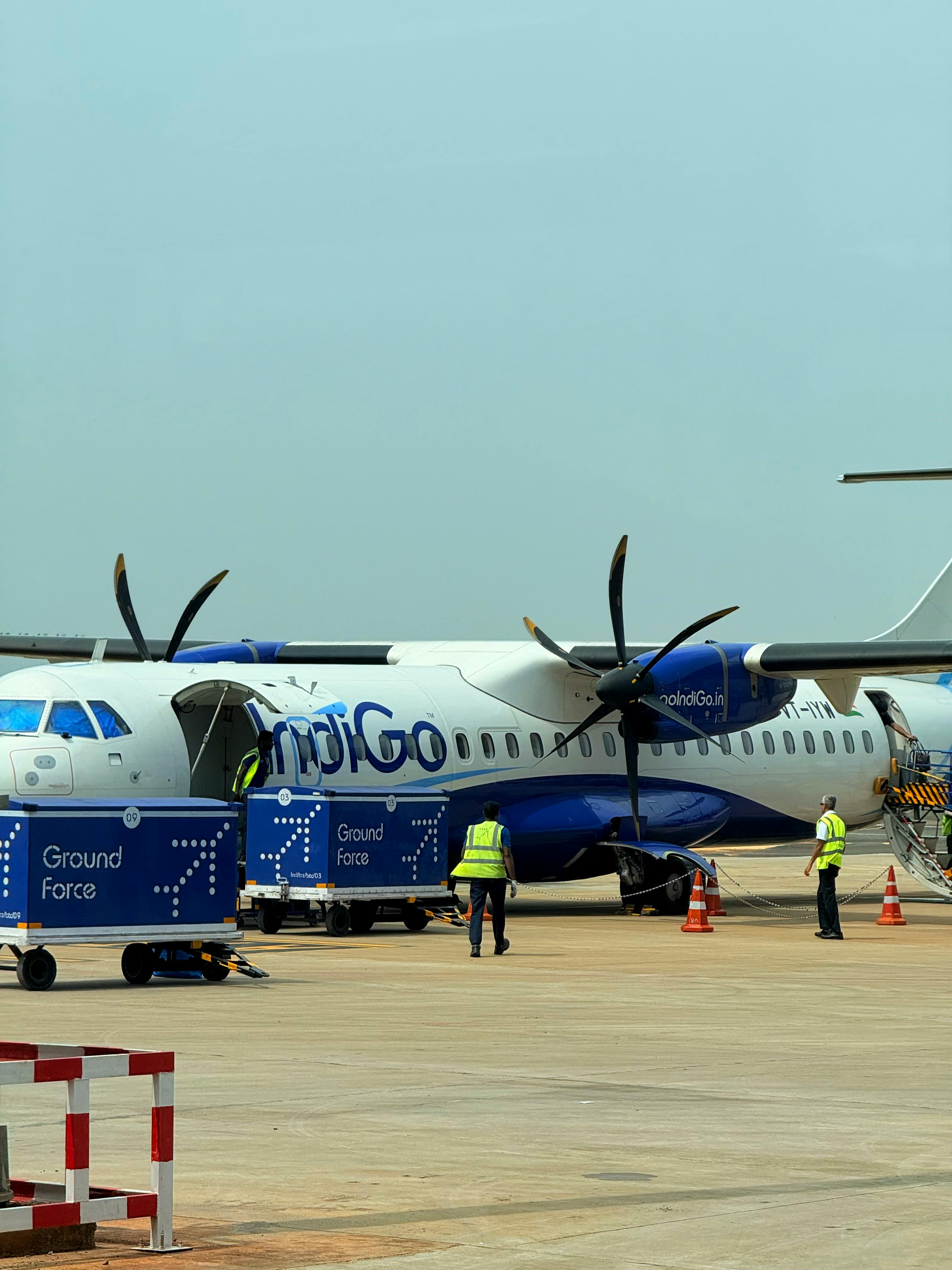 indigo aircraft on tarmac at airport