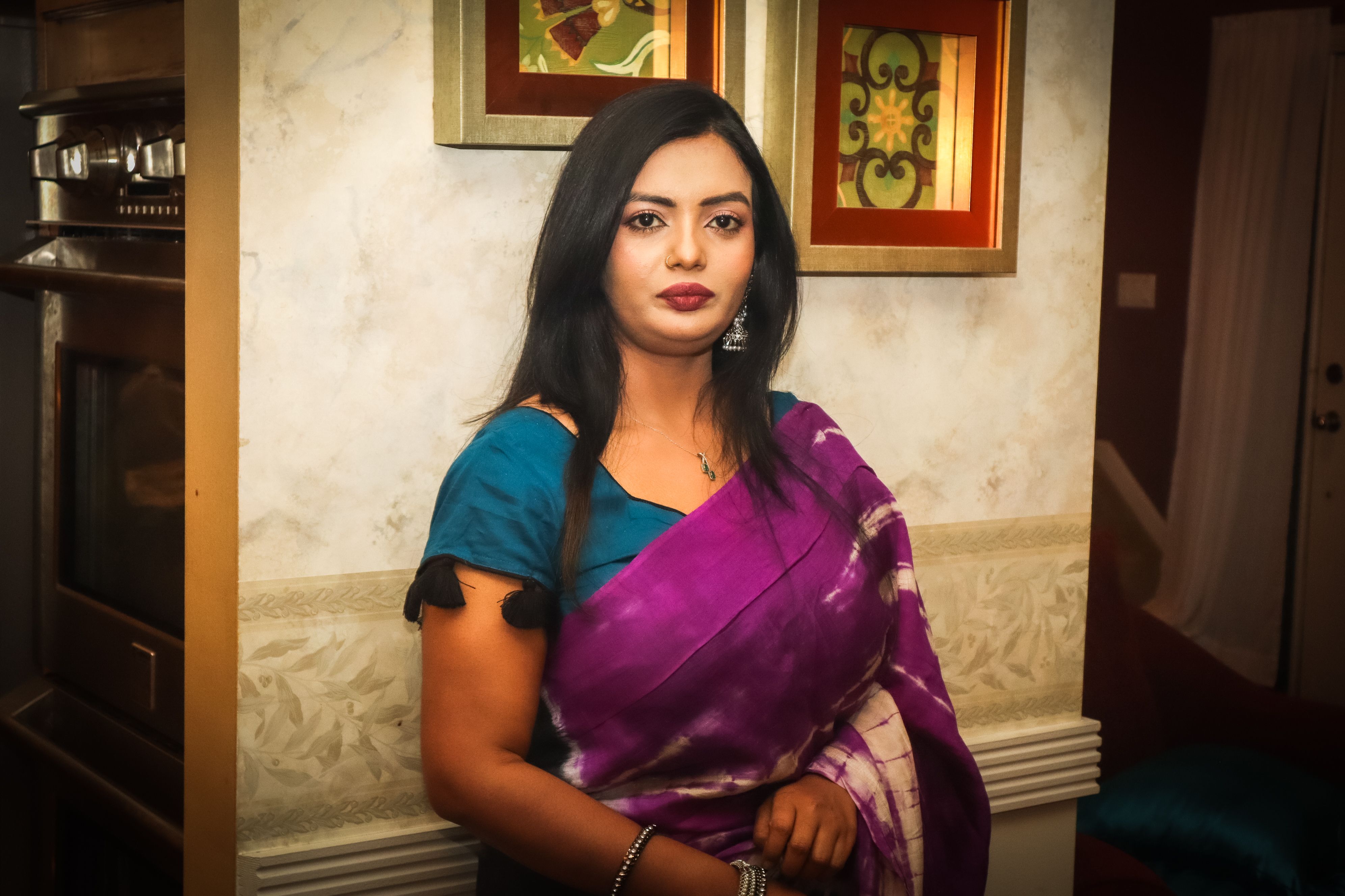 Elegant Woman in Traditional Attire Indoors · Free Stock Photo