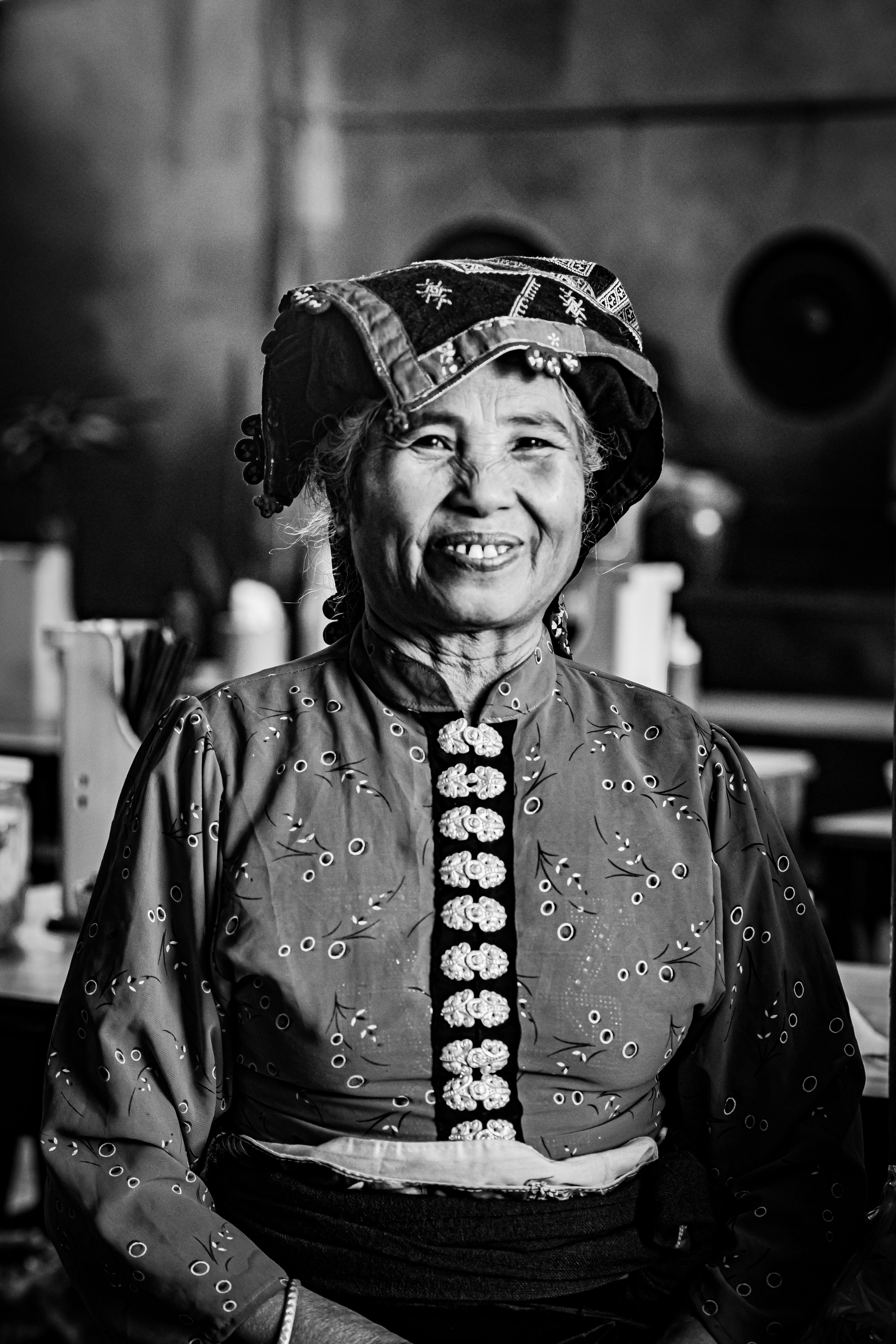 Portrait of a Smiling Woman in Traditional Attire · Free Stock Photo