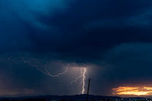 Intense lightning strike during a thunderstorm over Ephangweni, KwaZulu-Natal, showcasing nature's raw power.