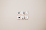 Gender Pronoun Tiles with She Her Text