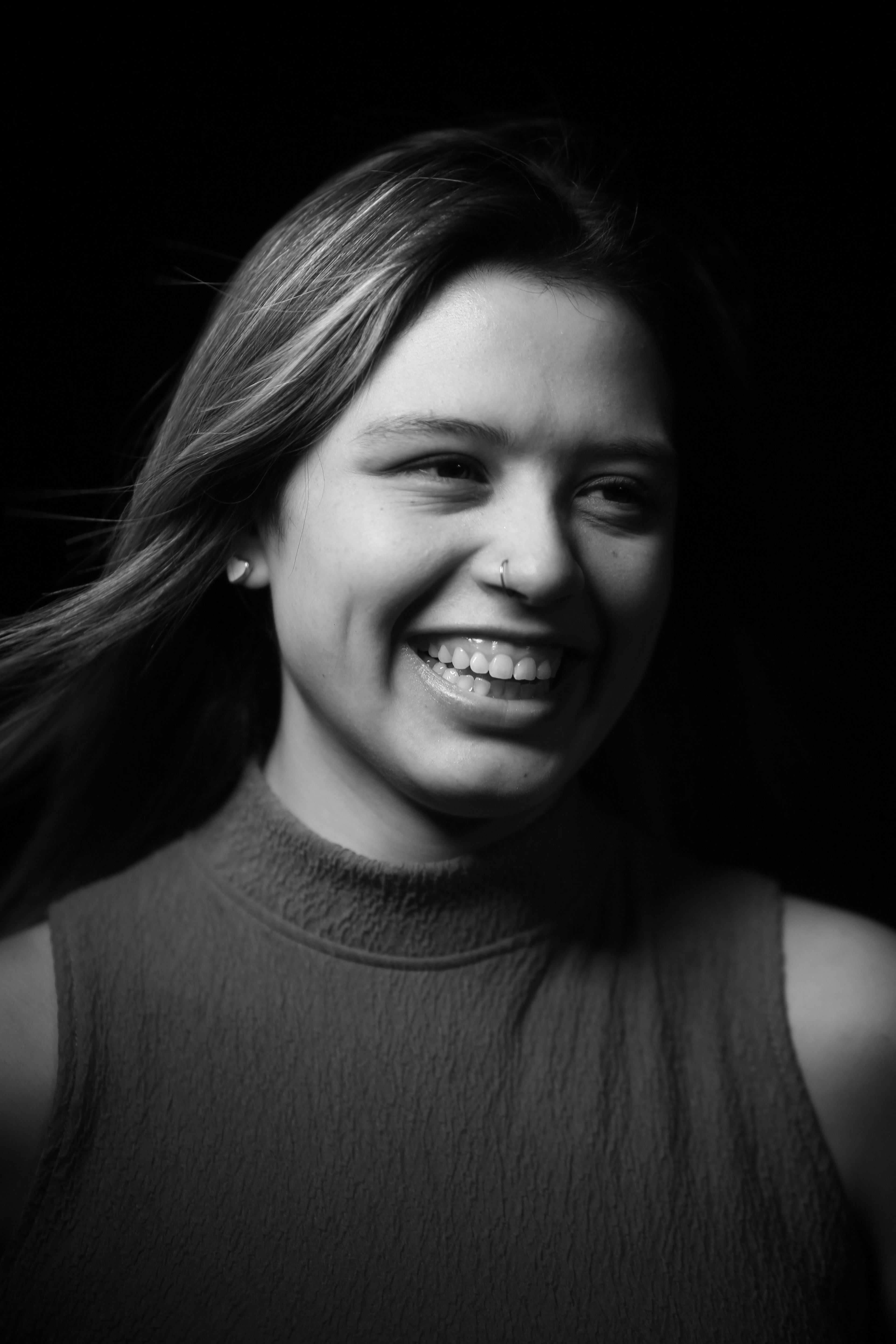 Black and White Portrait of a Smiling Woman · Free Stock Photo