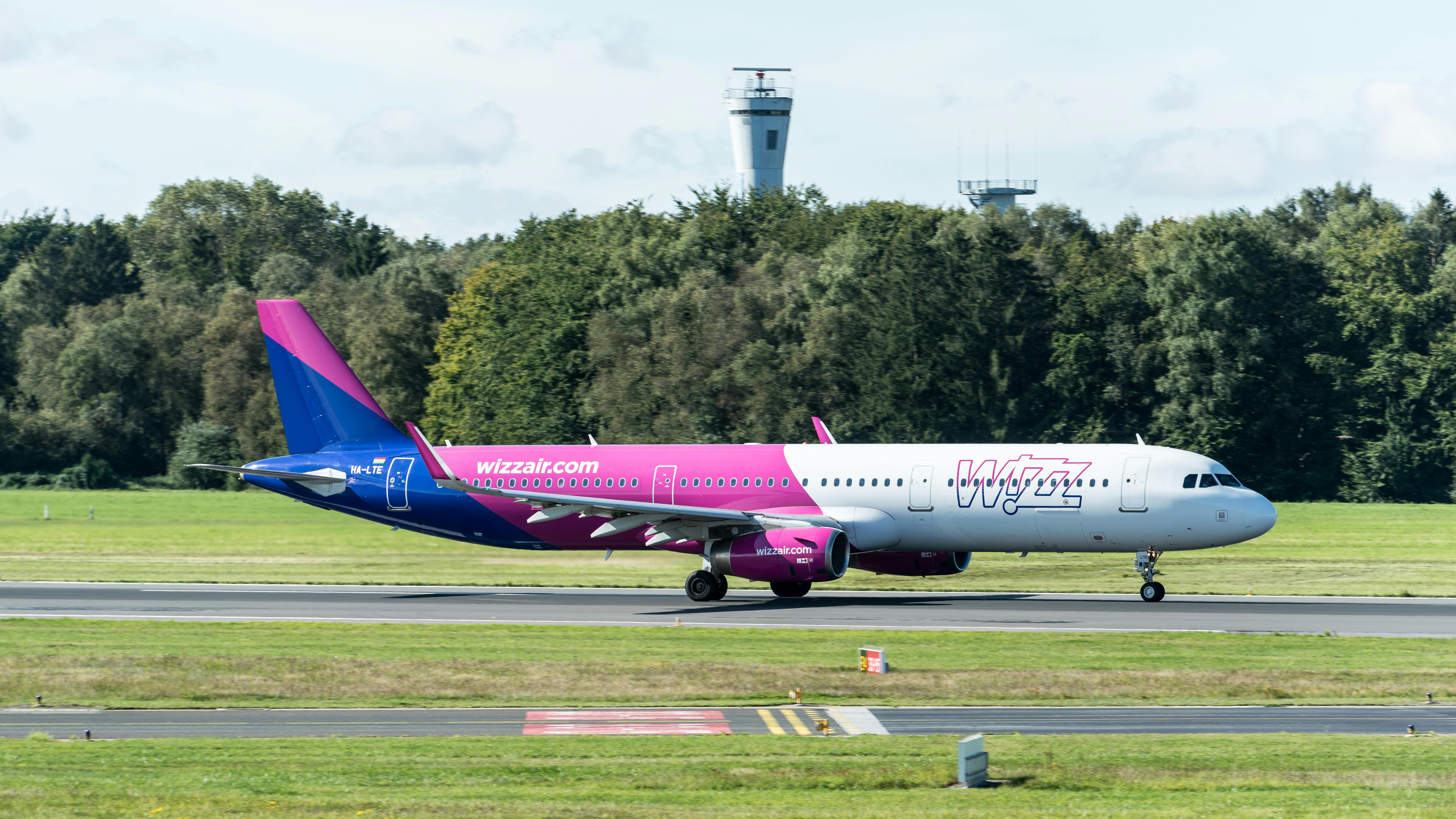 wizz air airbus a321 at hamburg airport on runway