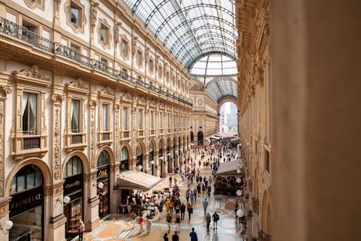 Interior view of Galleria Vittorio Emanuele II in Milan, showcasing its stunning architecture and bustling crowds. by Tuur  Tisseghem