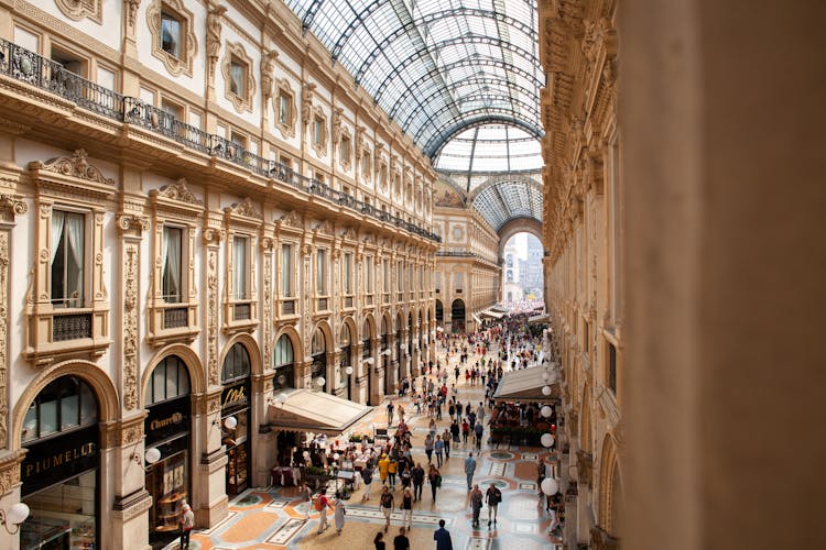 People Inside Galleria Vittorio Emanuele II Shopping Mall In Italy