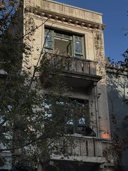 Free A vintage building facade in Istanbul with sunlight and shadows. Stock Photo