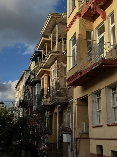 Free A view of rustic balconies in a historic Istanbul neighborhood with rich architectural details. Stock Photo