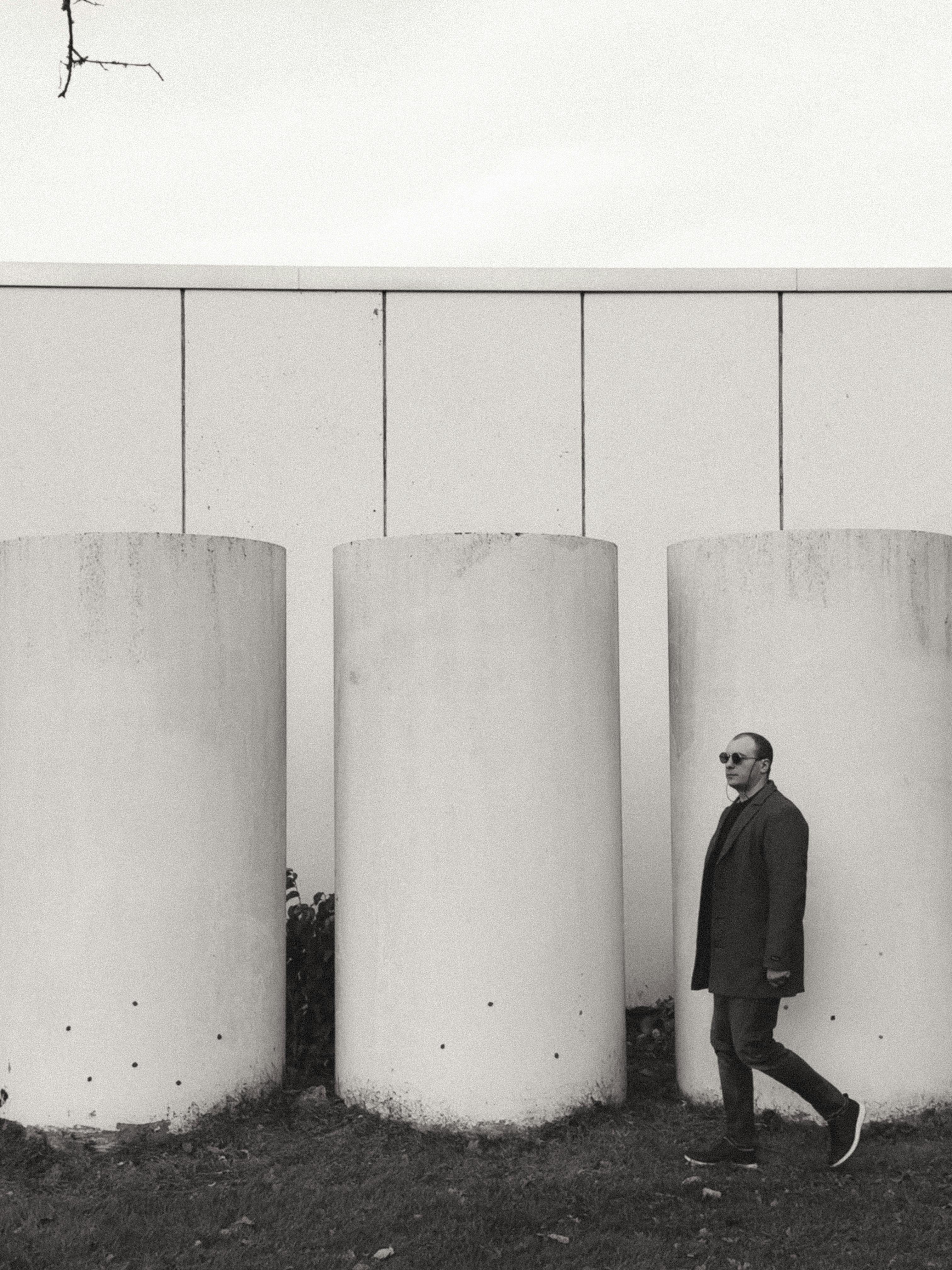 monochrome urban scene with man walking