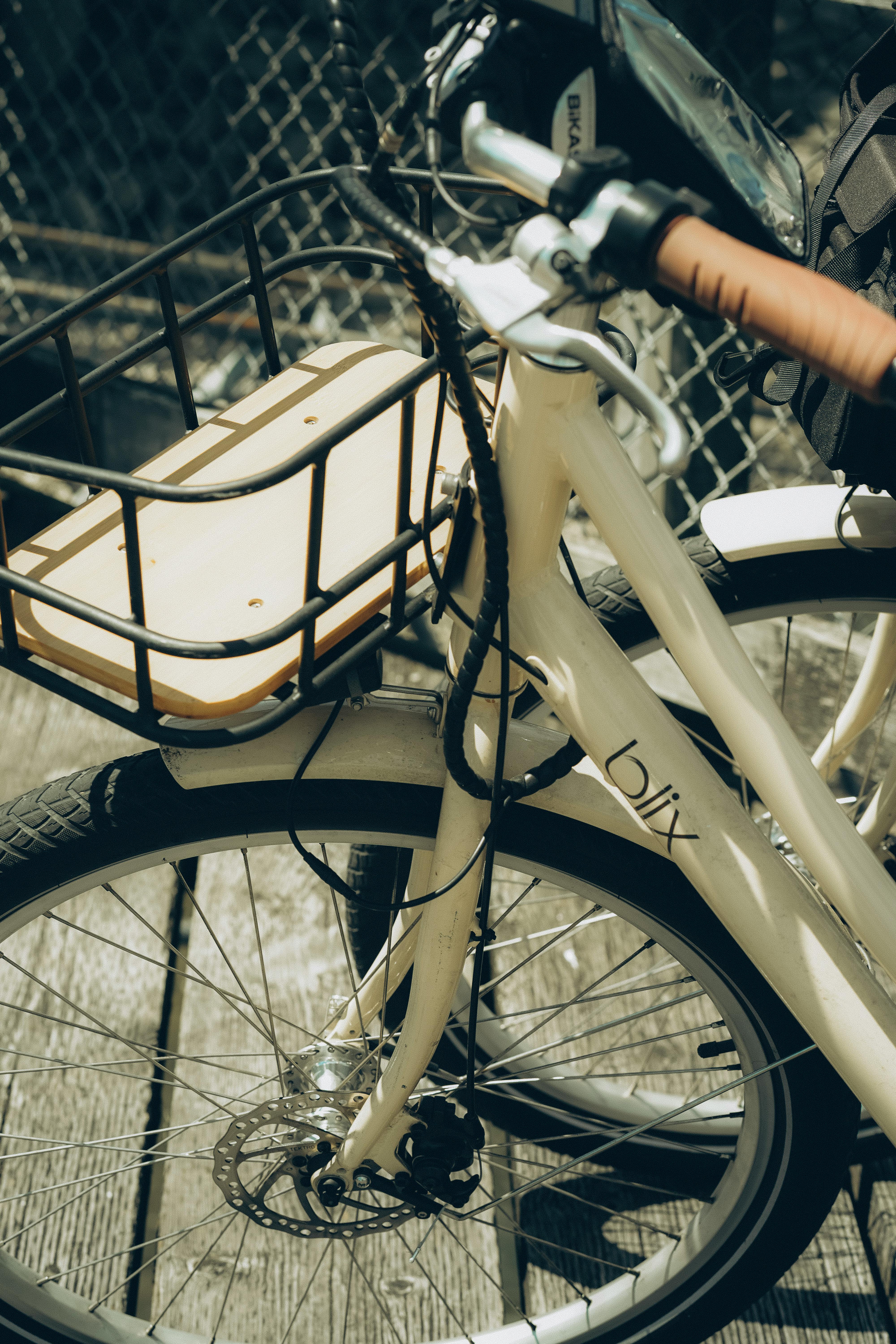 A vintage-style bicycle with a basket, ideal for leisurely rides and local trips.