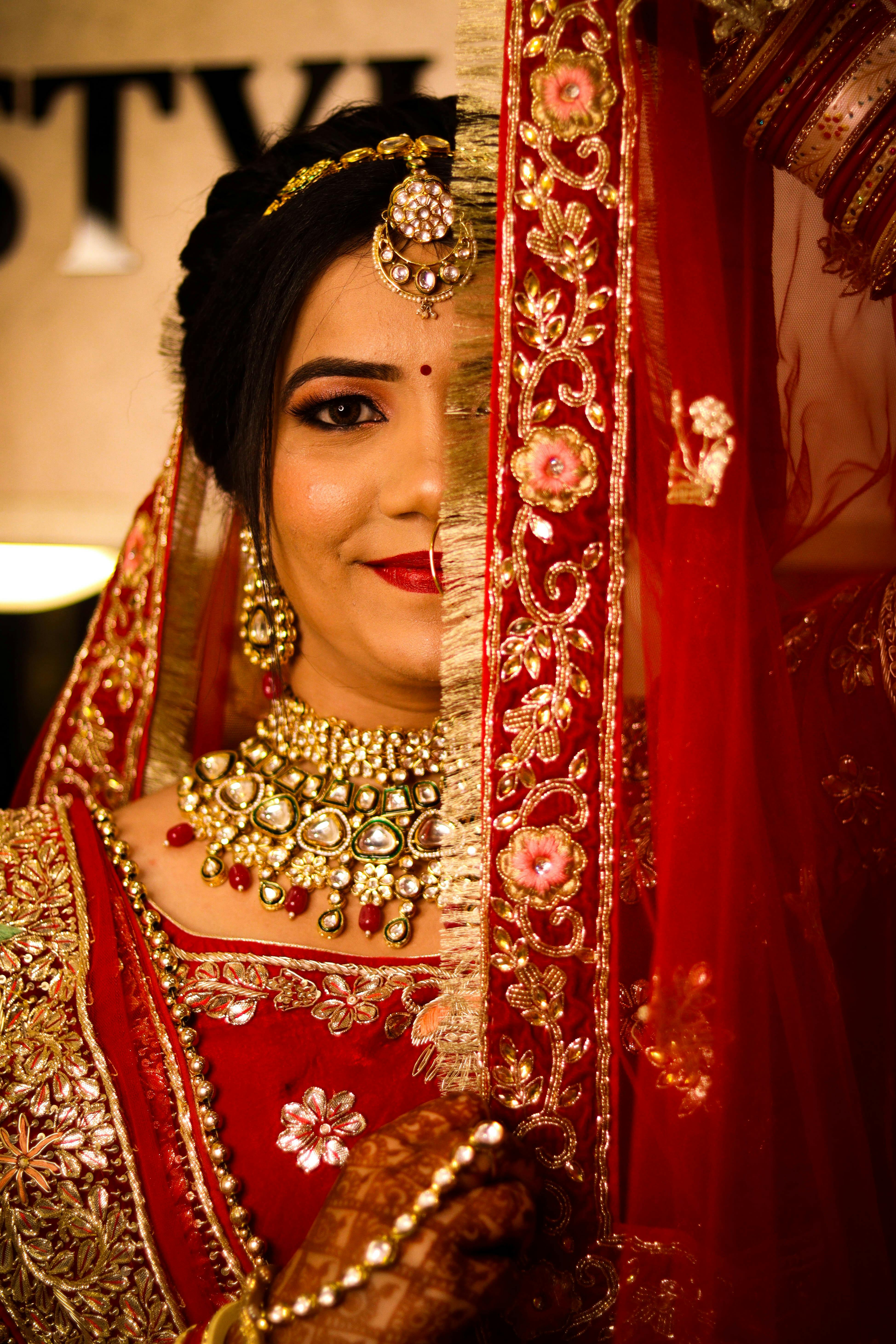 stunning indian bride in traditional red saree