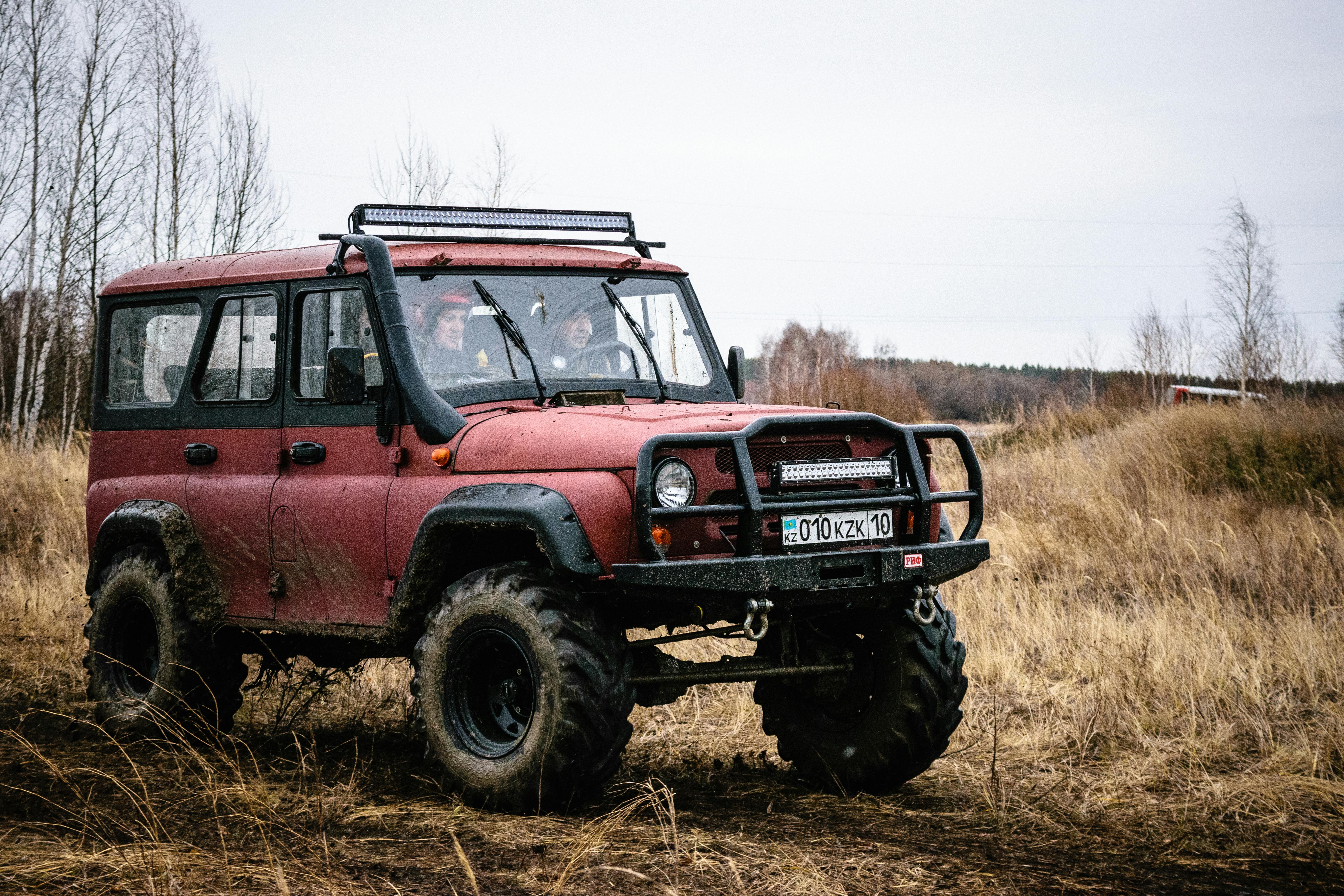 An off-road vehicle tackles the rugged terrain of Kazakhstan in an exciting motorsport adventure.