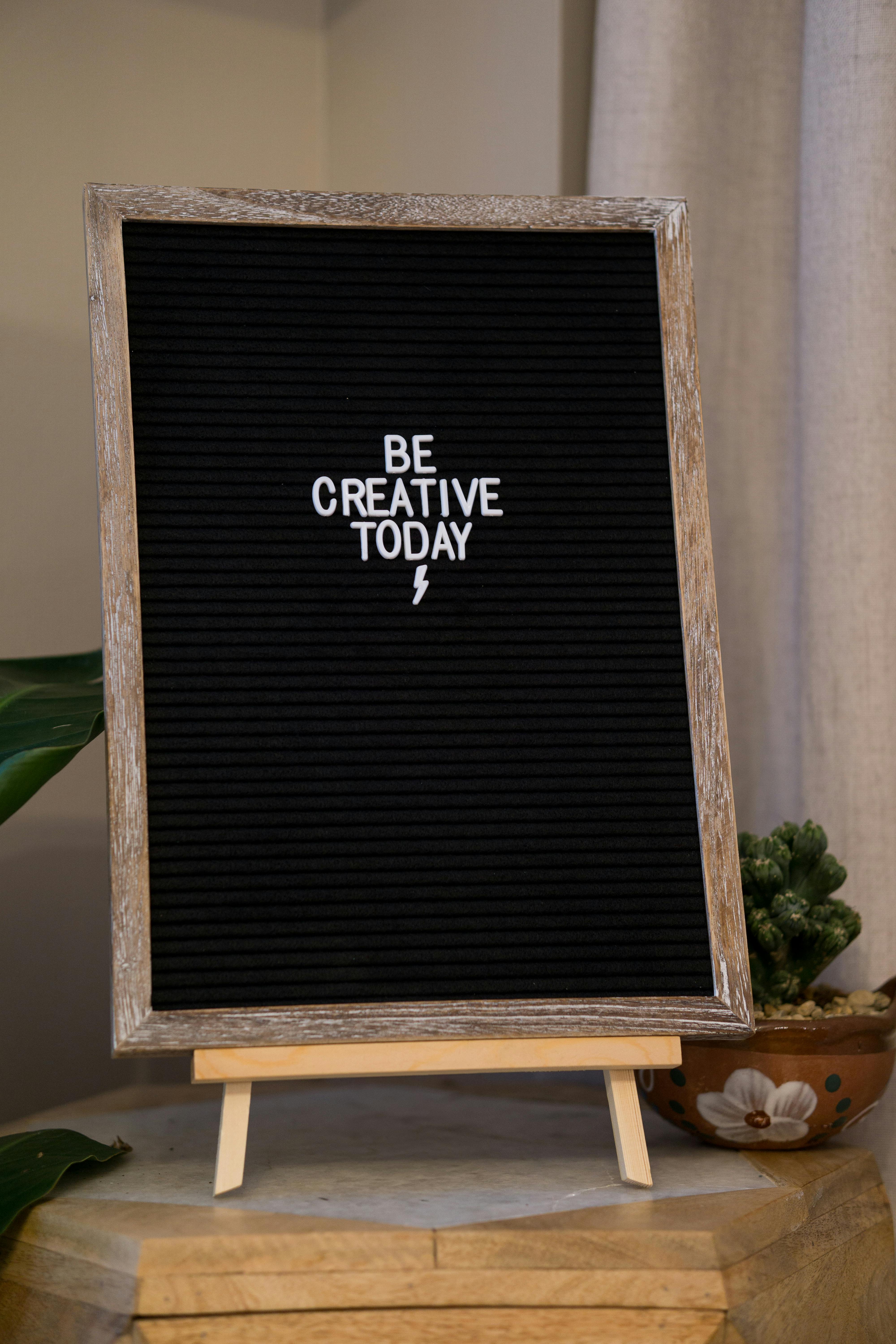 Inspirational letter board with be creative today message for motivation.