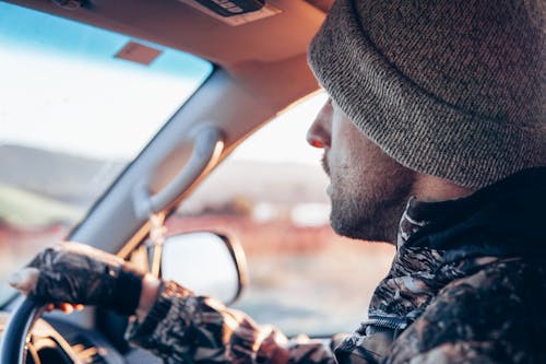 Free Man Driving Car during Day Stock Photo