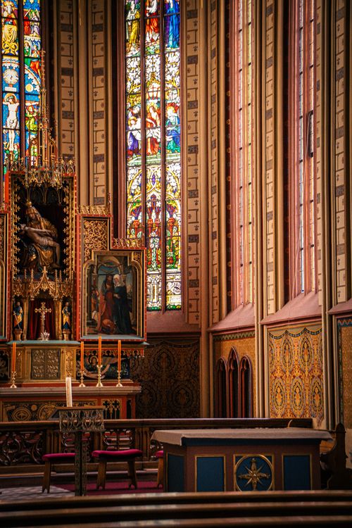 Free Discover the intricate stained glass and baroque altar in a historic German church. Stock Photo