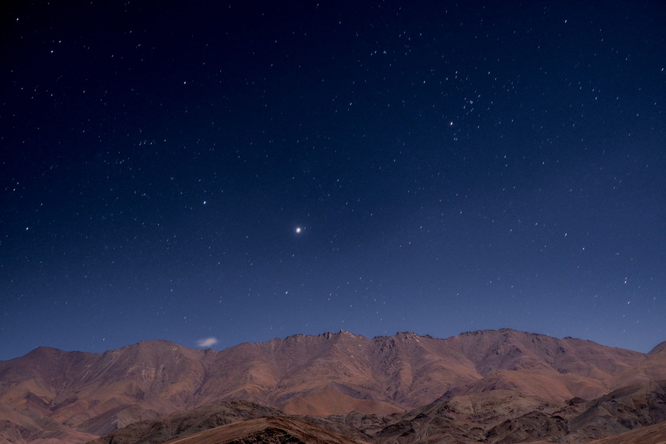 Starry Night Sky over Mountain Landscape · Free Stock Photo