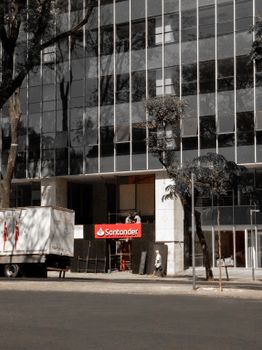 Modern facade of Santander Bank in Belo Horizonte, showcasing urban architecture.