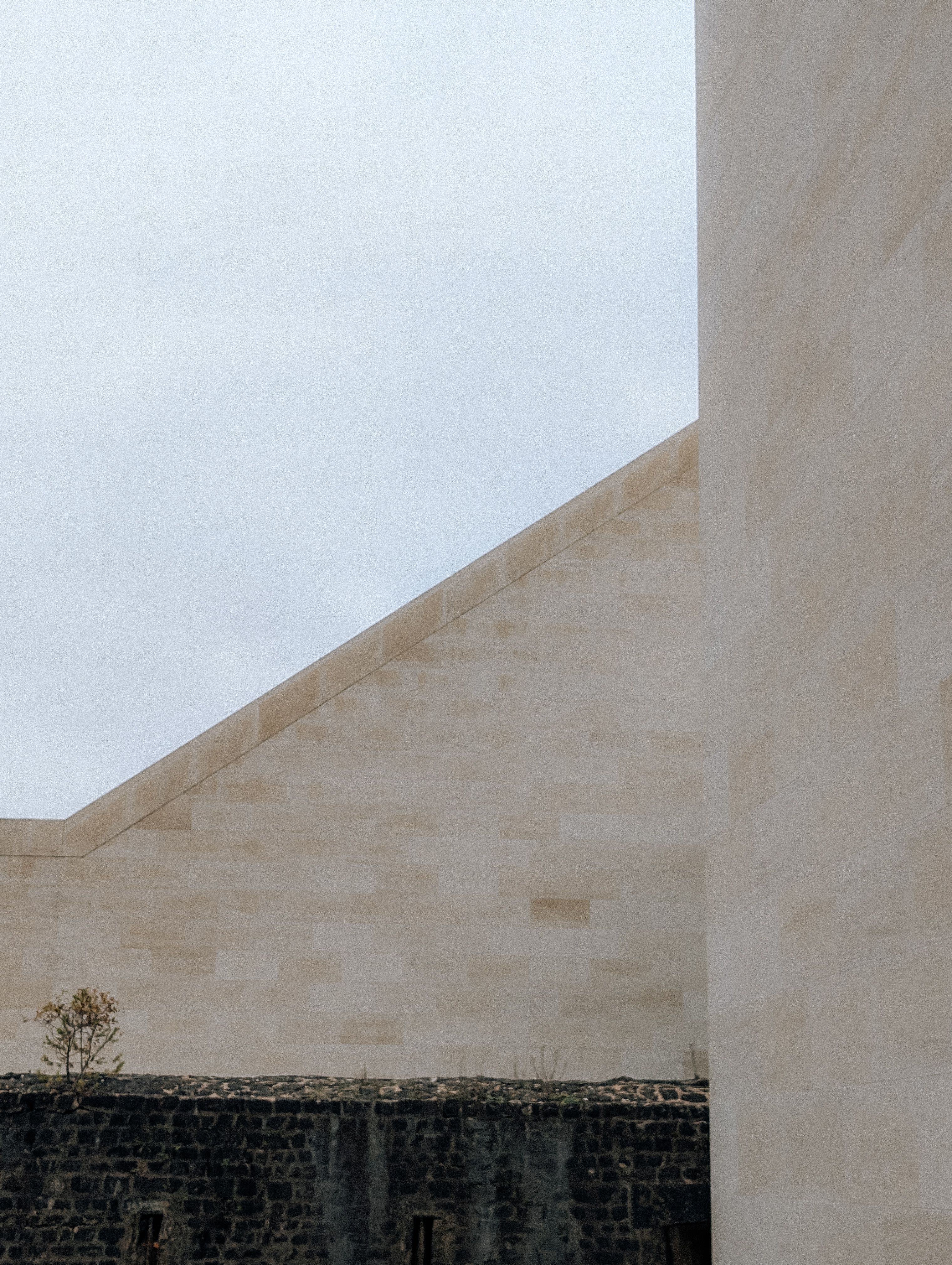 Minimalist architectural view in Luxembourg showcasing modern stone facades.