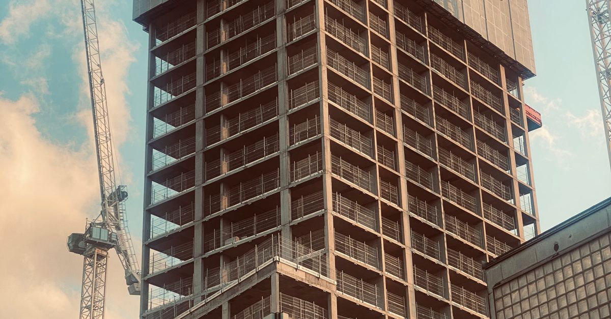 High Rise Building Contracting Modern High-Rise Building Construction in Cityscape · Free Stock Photo