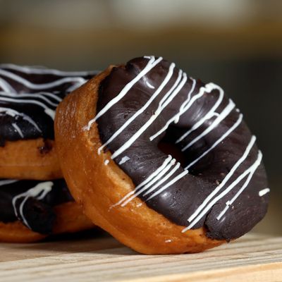 Chocolate frosted mini donuts — photo by Nishant Aneja on Pexels