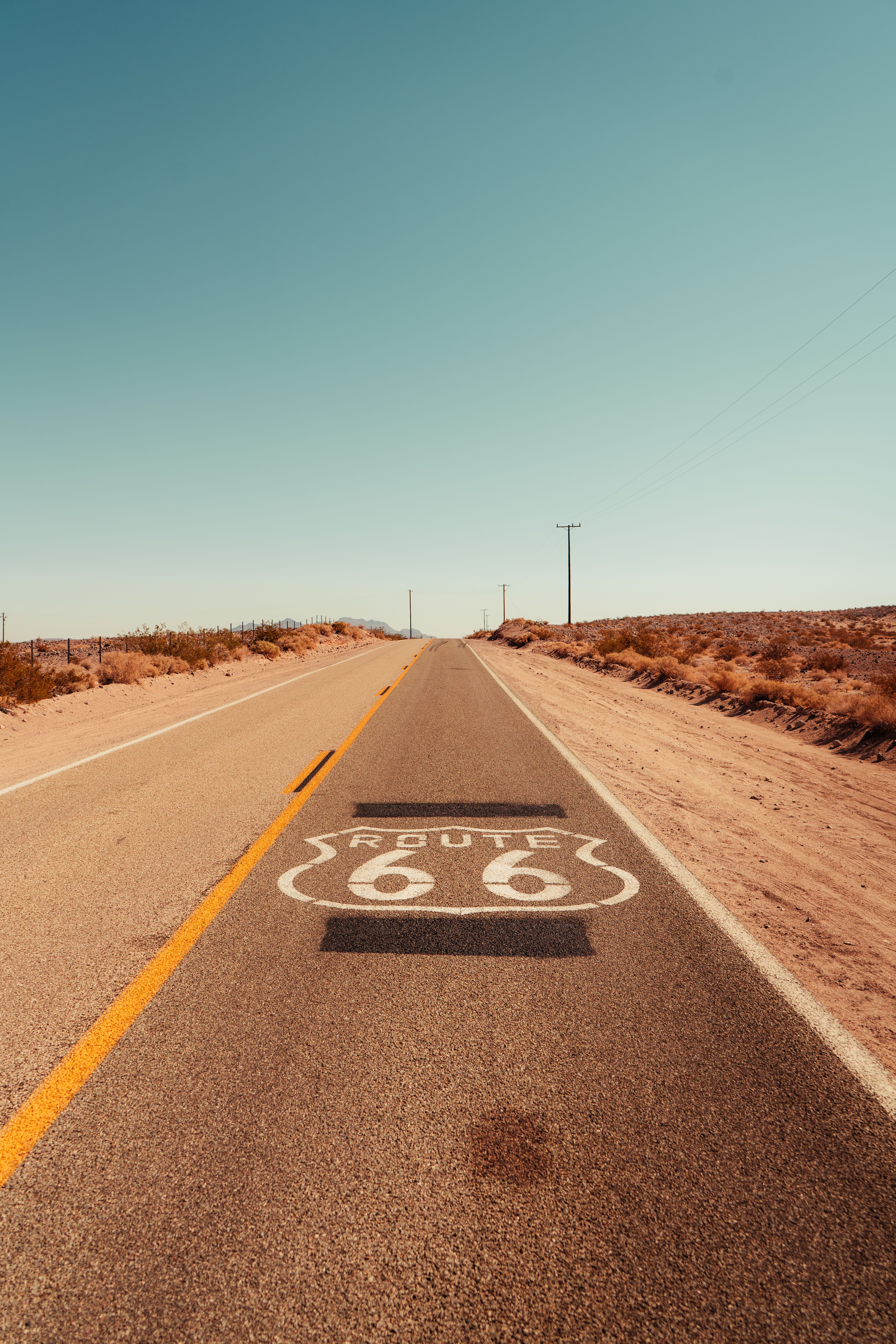 Empty stretch of Route 66 running through the California desert