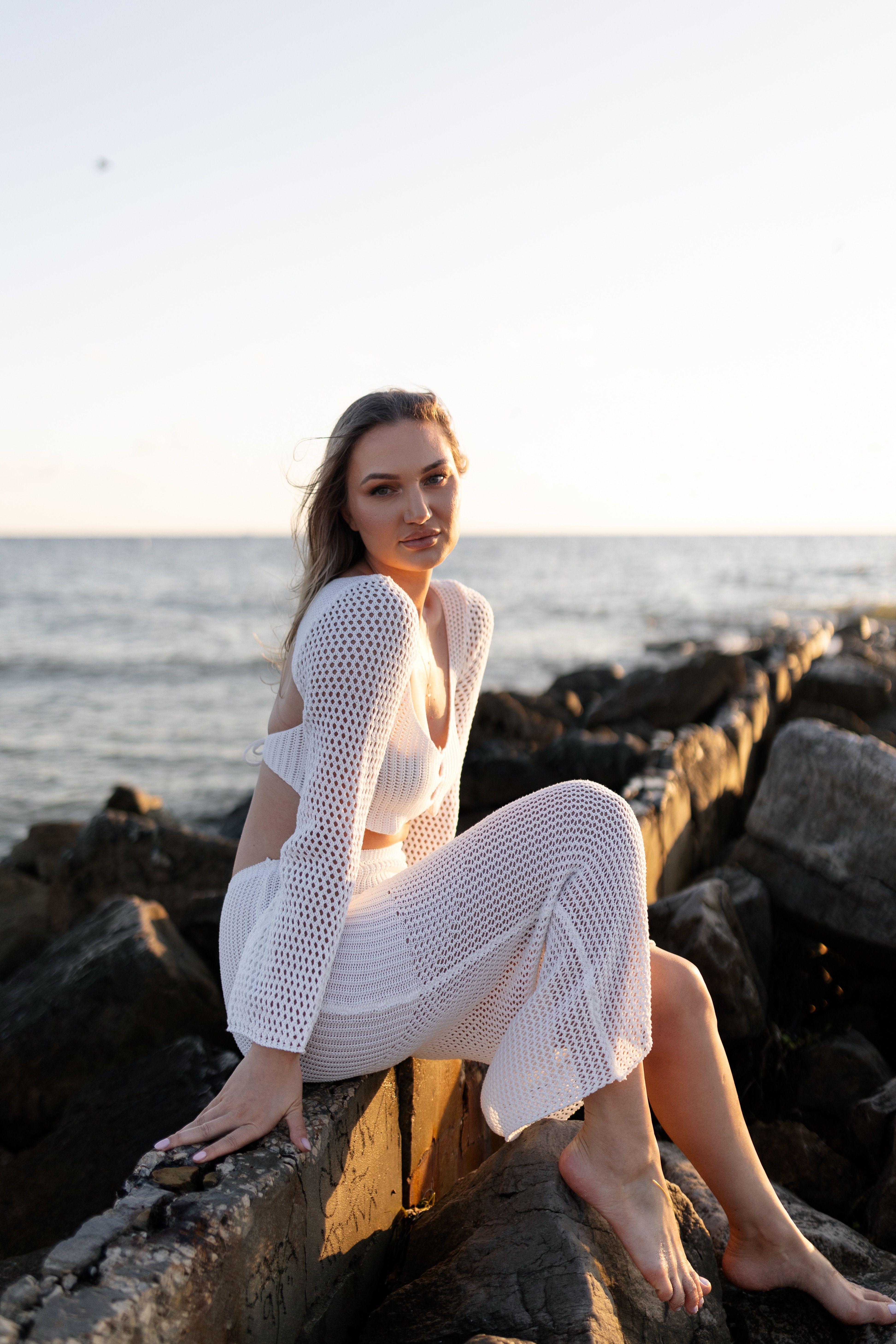 Woman in White Dress by the Sea at Sunset · Free Stock Photo