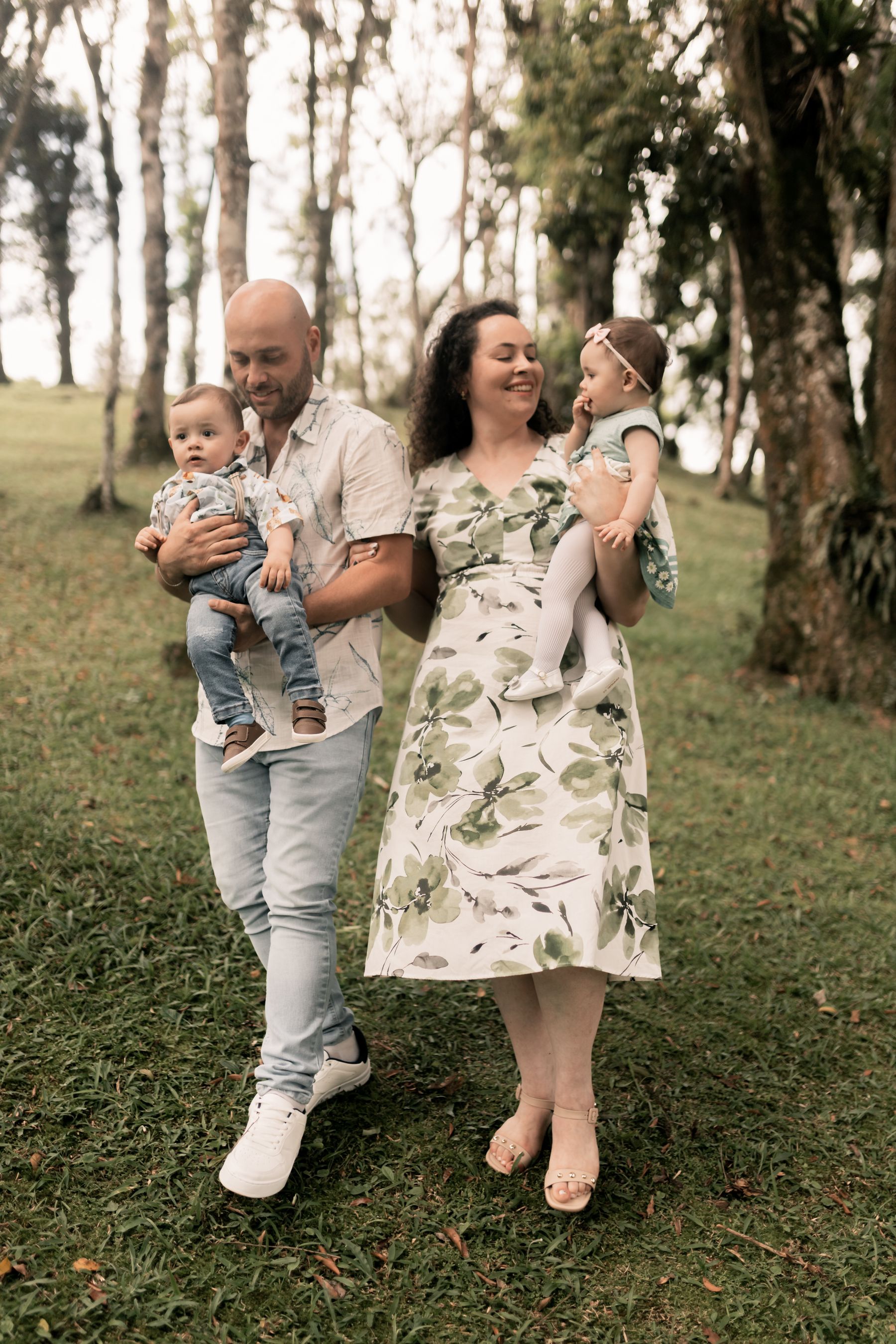 Parents walking with their two young children