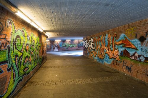 Free Colorful graffiti adorns a tunnel in Munich, Germany, showcasing urban street art. Stock Photo