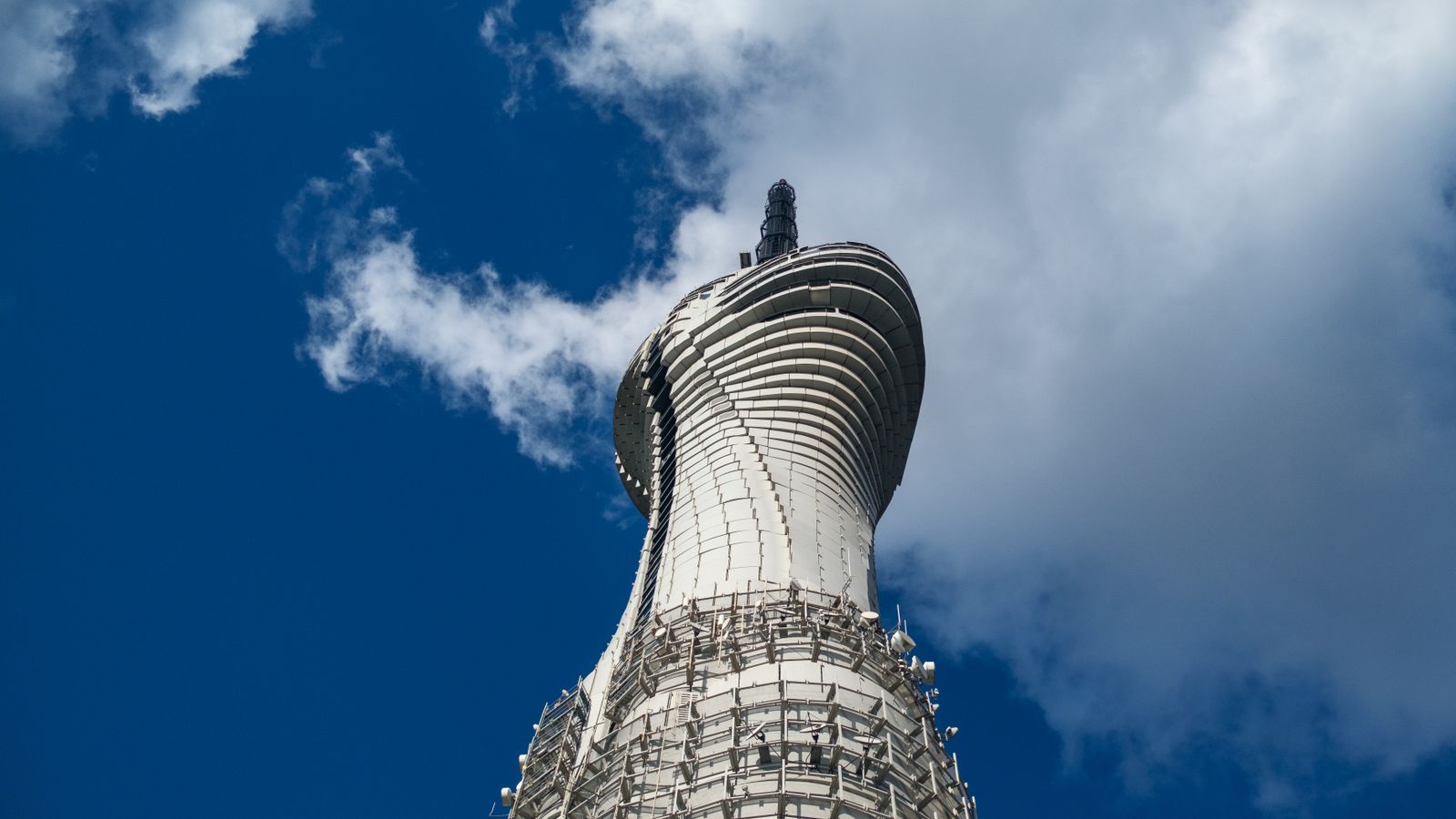 Modern architectural tower against blue sky, Togo