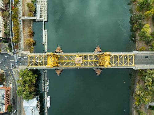 Free Stunning aerial shot of Tower Bridge over Sacramento River in autumn. Stock Photo