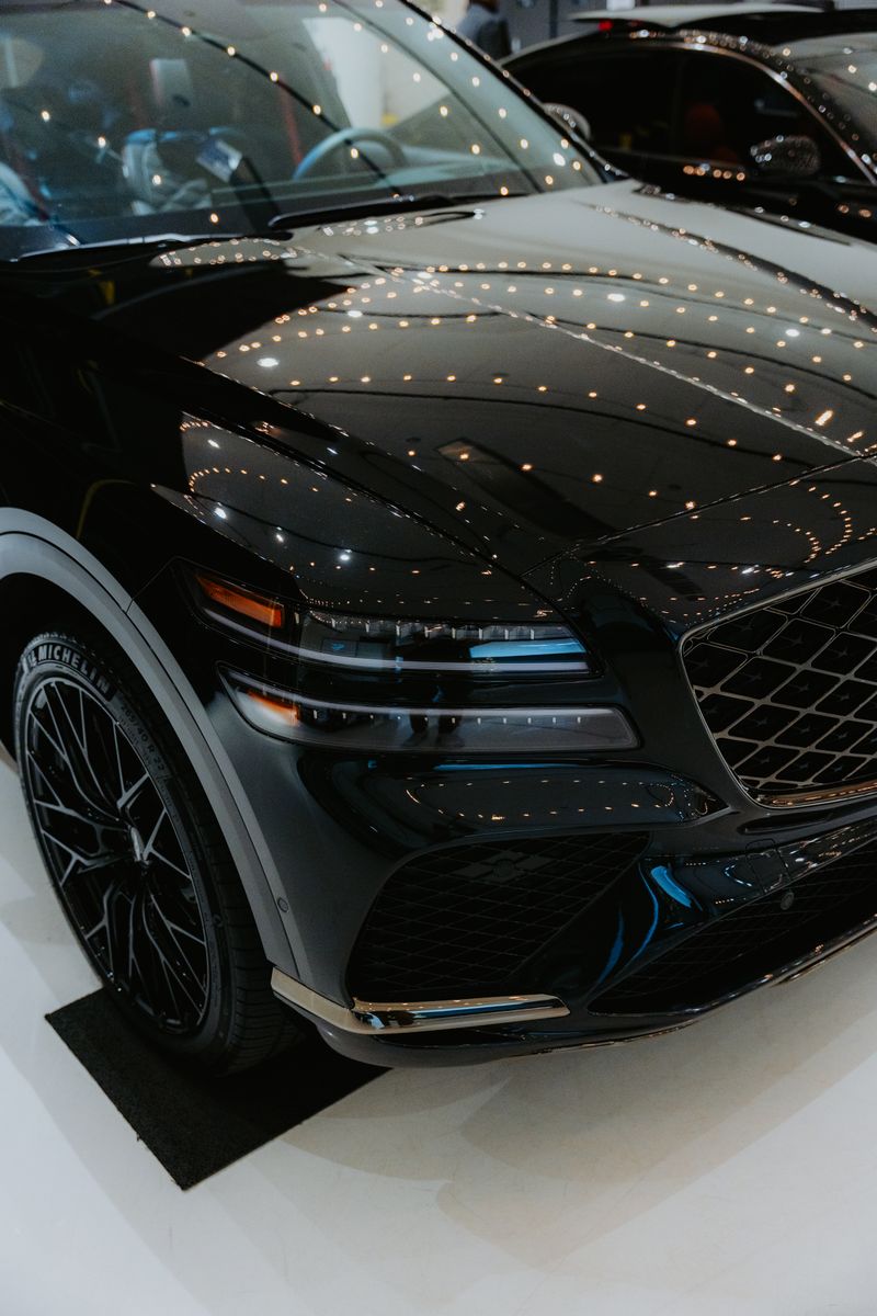 Black SUV in showroom